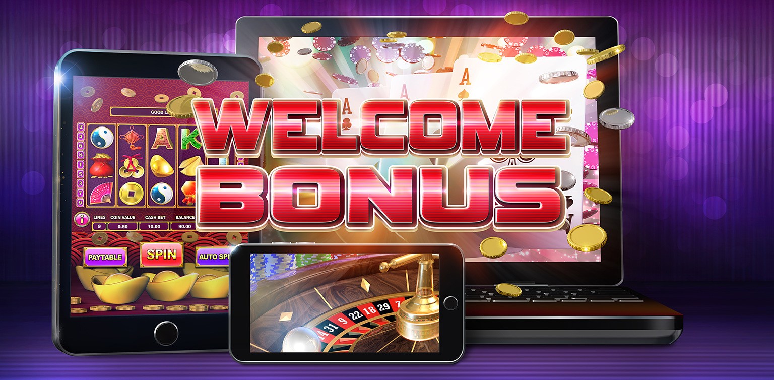 A laptop, smartphone and tablet displaying various casino games with the words welcome bonus in red on a purple background